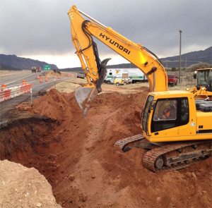 Track hoe excavating Cedar City